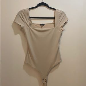 Off white skin tight body suit